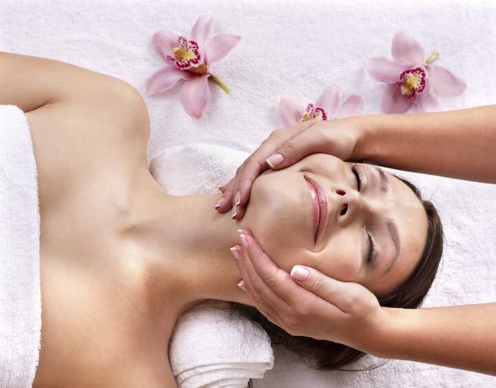 woman having face massage